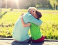 Grandfather and grandson hugging on berth Royalty Free Stock Photo