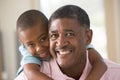 Grandfather and grandson smiling Royalty Free Stock Photo