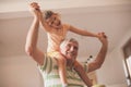 Grandpa with his granddaughter. Fun at home. Royalty Free Stock Photo