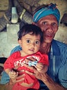 Grandfather with His Grandchild, Sumba, Indonesia Royalty Free Stock Photo