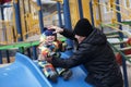 Grandfather holding toddler on slide Royalty Free Stock Photo