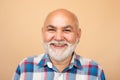 Grandfather pensioner, retiree concept. Happy old mature man smiling. Portrait of senior man in studio. Grey hair senior Royalty Free Stock Photo