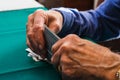 Old man hands playing cards in home Royalty Free Stock Photo