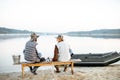 Grandfather with son fishing together Royalty Free Stock Photo