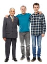 Grandfather, son and grandson isolated on white