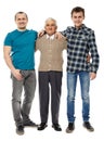 Grandfather, son and grandson isolated on white