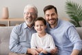 Grandfather son and grandson multi generational family portrait Royalty Free Stock Photo