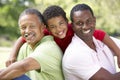 Grandfather With Son And Grandson In Park Royalty Free Stock Photo