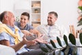 Grandfather telling story to son Royalty Free Stock Photo