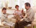 Grandfather telling telling a story to grandson Royalty Free Stock Photo