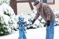 Grandfather and toddler boy on winter day Royalty Free Stock Photo