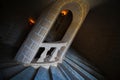 Grandiose interior winding stone spiral staircase with marble steps Royalty Free Stock Photo