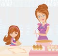 Grandma baking cookies with her granddaughter Royalty Free Stock Photo