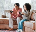 Grandma, child and video game on couch, controller and happy together with bond, contest and love in lounge. Senior Royalty Free Stock Photo