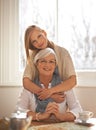 Grandma, grandchild and happiness with care in portrait at nursing home for visit and conversation with love. Mature Royalty Free Stock Photo