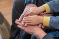 Grandma and grandpa and grandson holding hands. Six palms touching each other Royalty Free Stock Photo