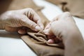Grandma hand needle and sewing making cloth
