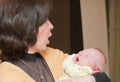 Grandma holds the newborn grandson Royalty Free Stock Photo