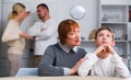 Grandma hugging upset boy during parental quarrel Royalty Free Stock Photo