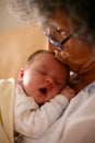 Grandma kissing baby Royalty Free Stock Photo