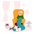 Grandma knitting quilt of yarn in cozy armchair. Old woman happy with her hobby in living room. Elderly Lady with cat in