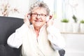 Grandma listens to music.