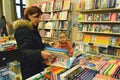 Grandma and nephew choosing a book