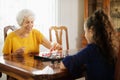 Grandma Playing Checkers Board Game With Granddaughter At Home Royalty Free Stock Photo