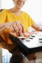 Grandma Playing Checkers Board Game In Hospice Royalty Free Stock Photo