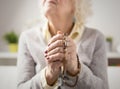 Grandma praying with rosary Royalty Free Stock Photo