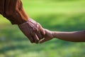 Grandma`s hand to walk to the garden Royalty Free Stock Photo