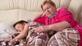 Grandma sleeps with her grandson