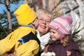 Grandmather and grandsons in park