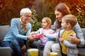 Grandmom with children playing