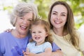 Grandmother with adult daughter and grandchild Royalty Free Stock Photo