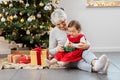 grandmother and baby girl with christmas gifts Royalty Free Stock Photo