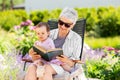 Grandmother and baby granddaughter reading book Royalty Free Stock Photo