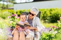 Grandmother and baby granddaughter reading book Royalty Free Stock Photo