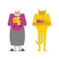 Grandmother and cat contrary. Granny strokes pet. Old lady and kitten in hands