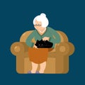 Grandmother and cat sitting on chair. granny cat lady. grandma a