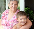 Grandmother and child indoors