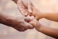 Grandmother and child little girl holding hand together Royalty Free Stock Photo