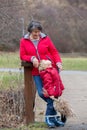 Grandmother and child in the park on a winter day, enjoying time together Royalty Free Stock Photo