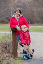 Grandmother and child in the park on a winter day, enjoying time together Royalty Free Stock Photo