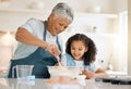 Grandmother, cooking or child baking in kitchen as a happy family with young girl learning cookies recipe. Mixing cake Royalty Free Stock Photo