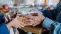 Close-up of grandmother giving gift to her granddaughter during Easter dinner. Royalty Free Stock Photo