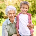 Grandmother, grandchild and hug with park, love and smile with portrait for senior and happiness. Woman, child and Royalty Free Stock Photo