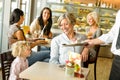 Grandmother and grandchild waiting cake order cafe Royalty Free Stock Photo