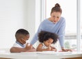 Grandmother and grandchildren playing cheerfully in living room, Children playing game with grandparents Royalty Free Stock Photo