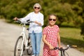 Grandmother and granddaughter with bicycles Royalty Free Stock Photo